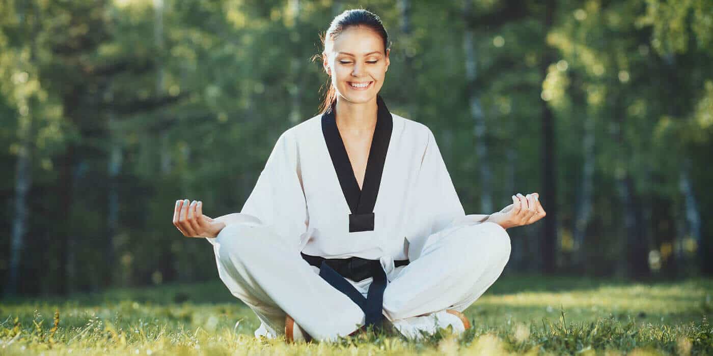 Martial Arts Lessons for Adults in Virginia Beach VA - Happy Woman Meditated Sitting Background